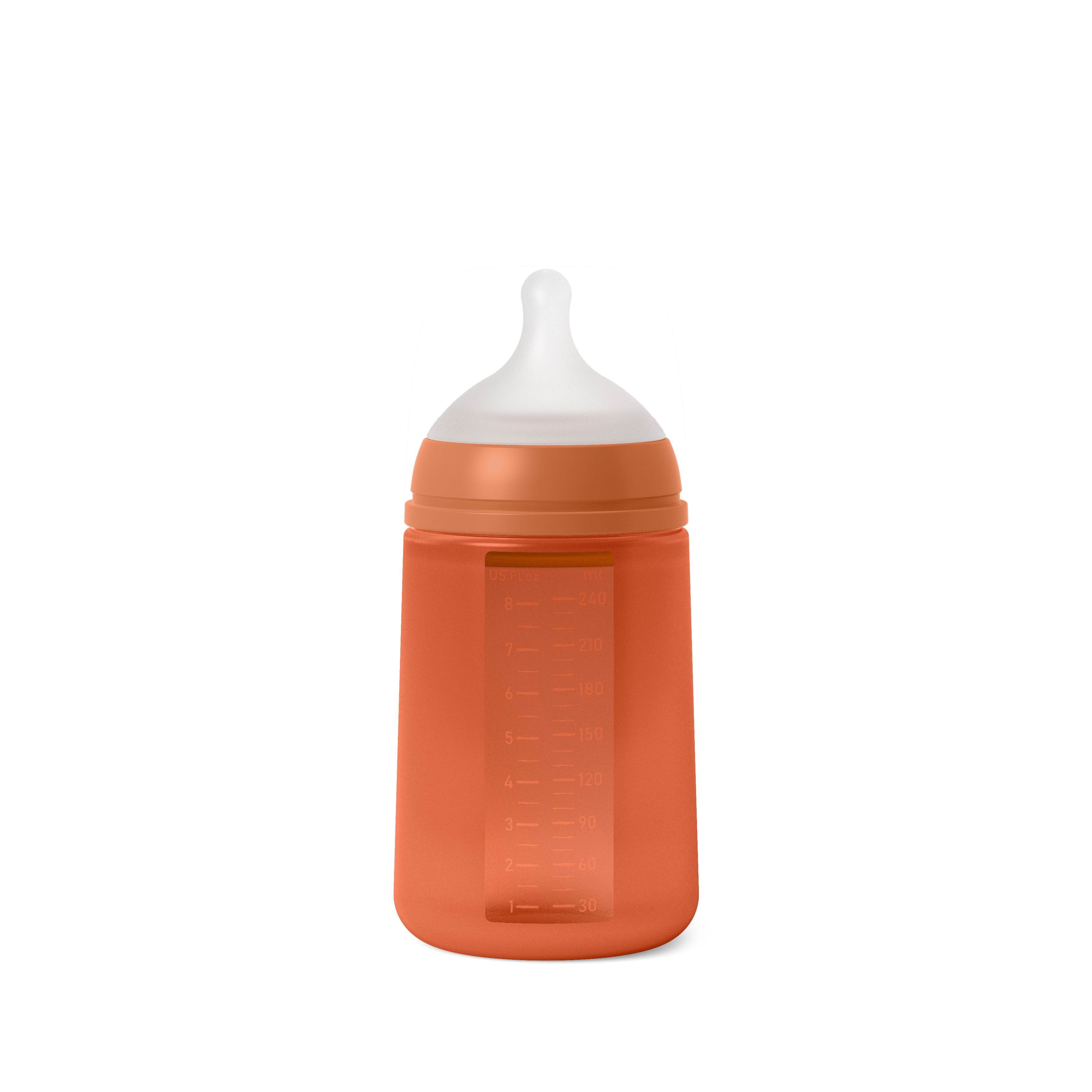 An orange Suavinex Color Essence silicone baby bottle with a medium flow nipple.